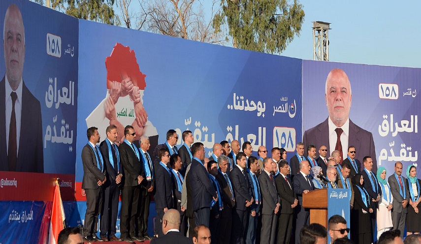 بالصورة ودحضاً للأكاذيب... صور العبادي تملأ مدينة قم الإيرانية